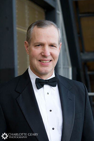 Father in classic black tuxedo