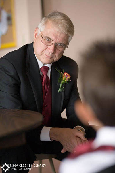 Red tie and black suit