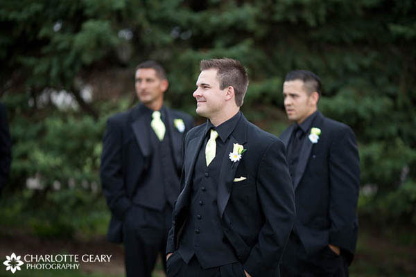 Groomsmen in black vests and shirts