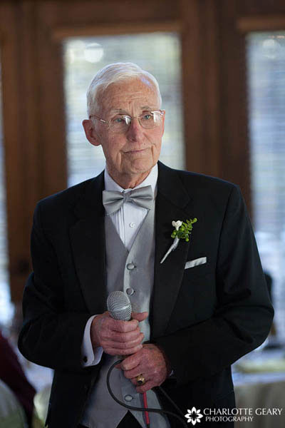Grandfather of the bride in a silver vest and bow tie