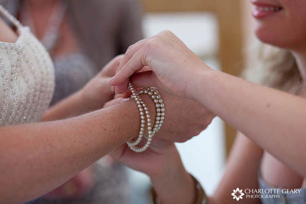 Bride with multi-strand pearl bracelets