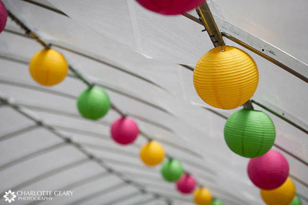 Colorful lanterns in wedding reception tent