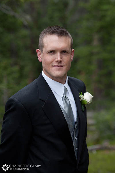 Groom with silver tie and vest