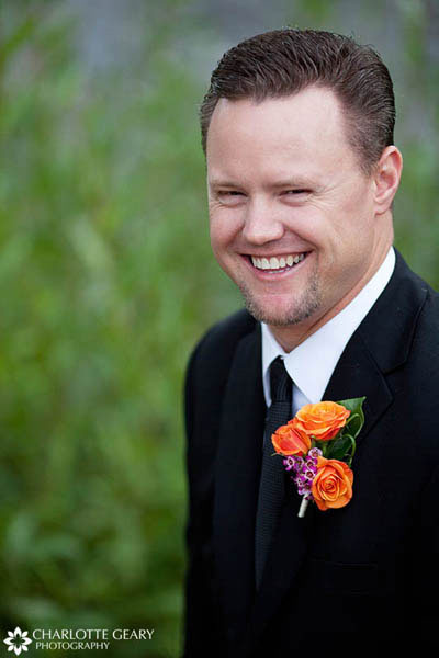 Groom in an orange boutonniere