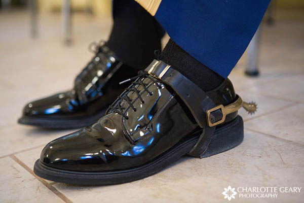 Groom in spurs 