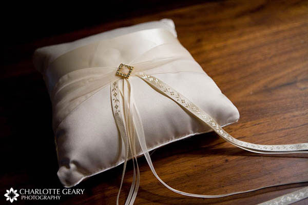 White and gold ring pillow