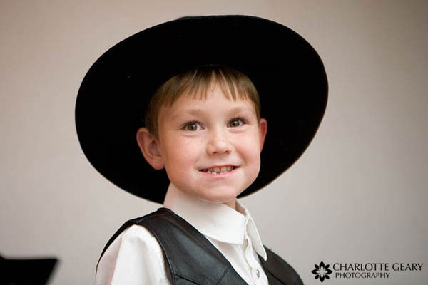 Ring bearer in black hat
