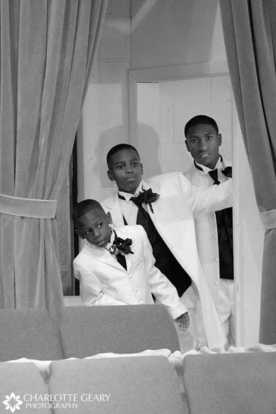 Ring bearers in white suits