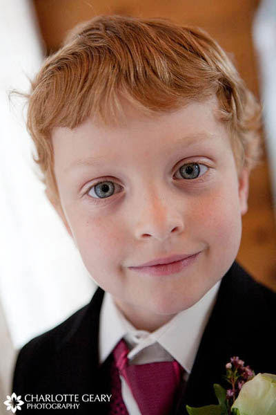 Ring bearer in red tie