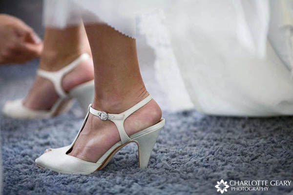 Bride in white shoes 