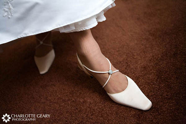 Bride in ivory shoes 