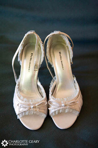 White bridal shoes with ruffle accent 