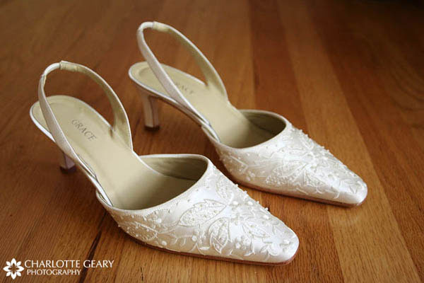 Embroidered ivory shoes