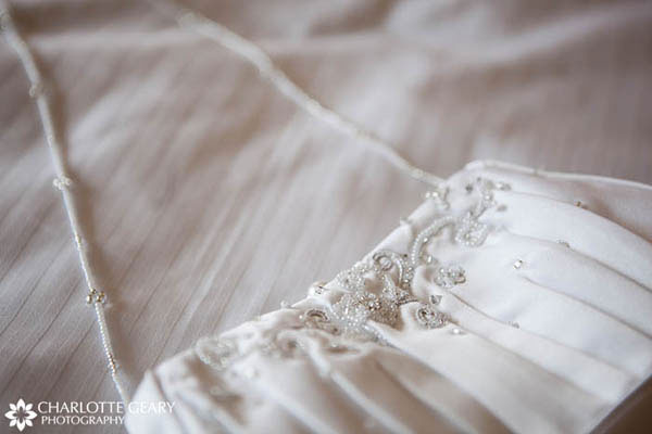 Pleated white beaded wedding purse